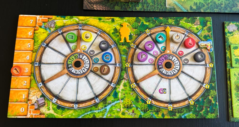 Black Forest board game components showing resource wheels