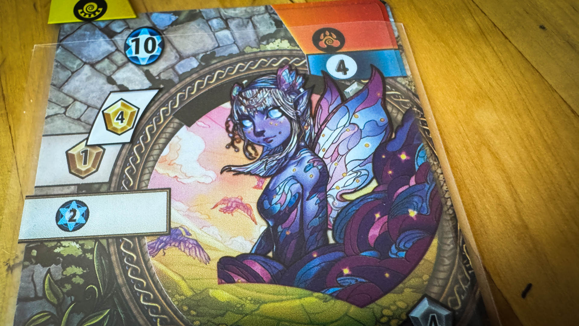 Mystic Lands board game with stained glass card art and Vale Map journey board