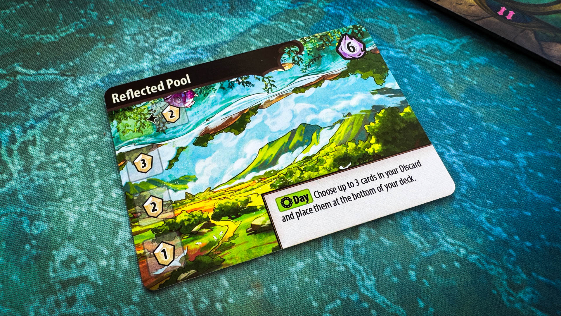 Mystic Lands board game with stained glass card art and Vale Map journey board