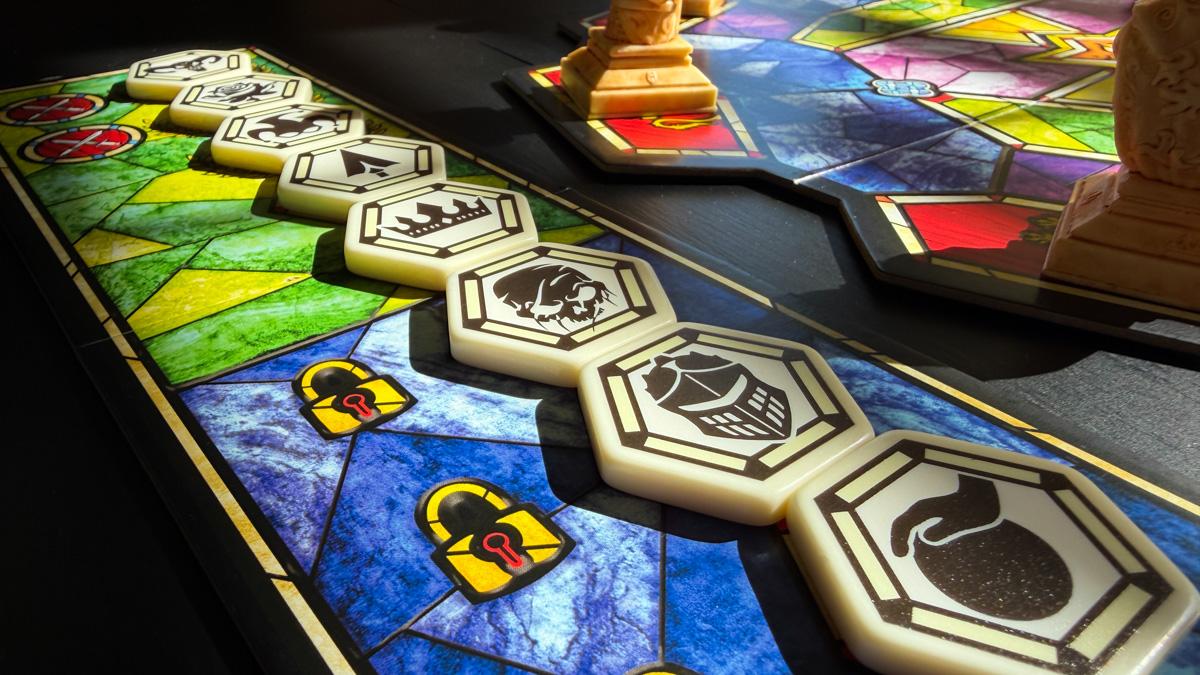 Enthrone — Position Track Tiles Enthrone position track tiles showing character icons and lock icons for action restrictions