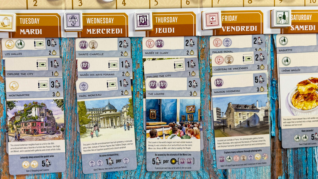 Let's Go to France — The Placement Puzzle Let's Go to France highlight of the day card placement puzzle showing scoring mechanic