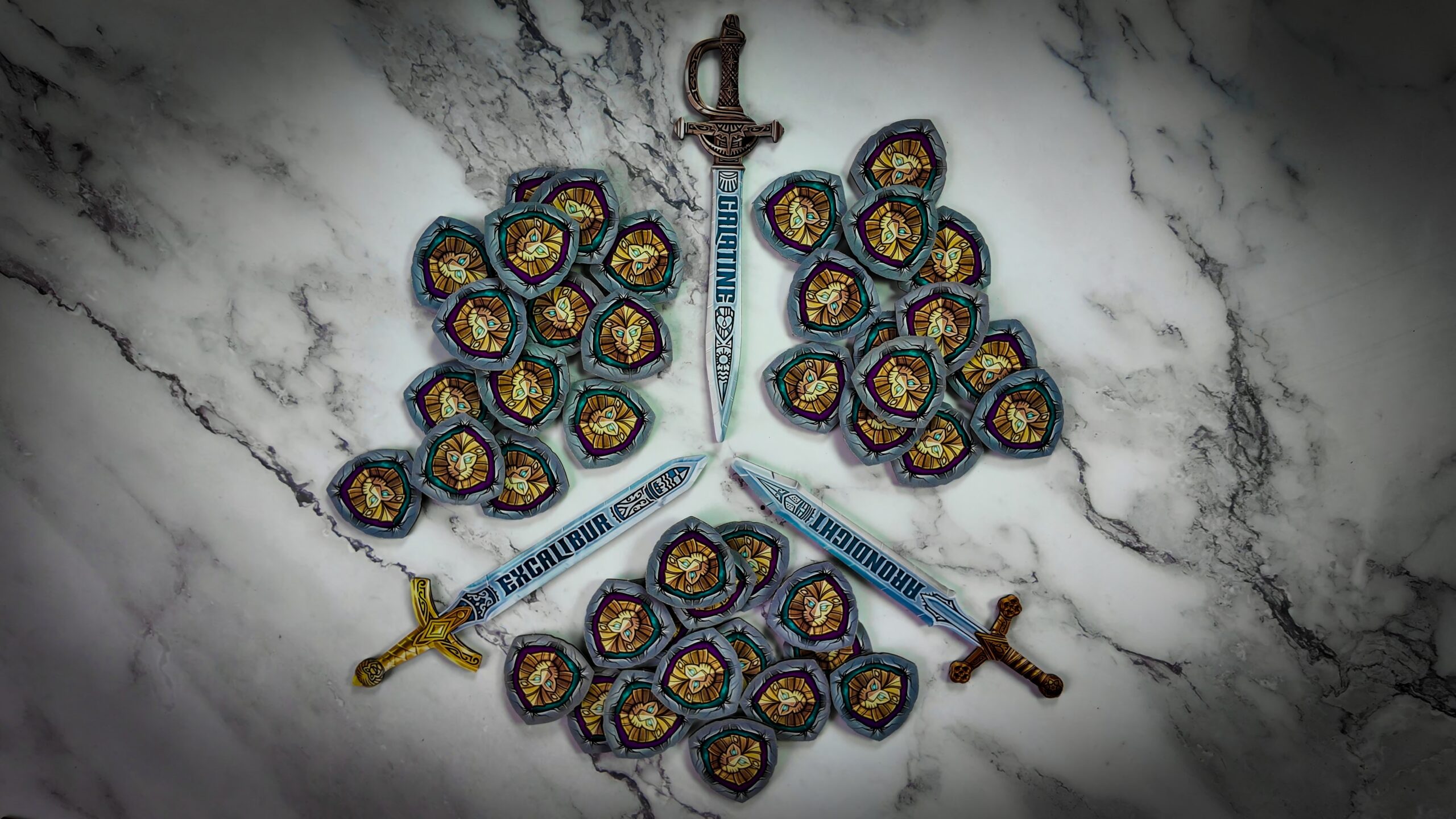 A player's hand holding several round character chips from the Excalibur board game.