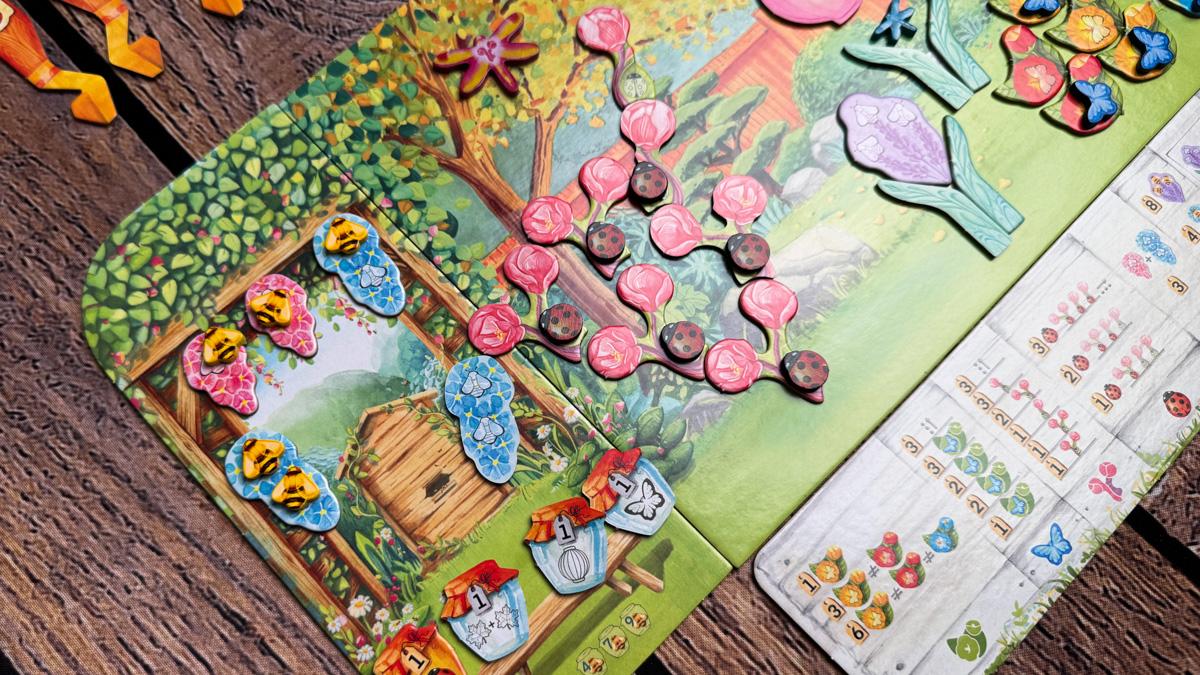 The adorable frog meeple, "Mabel," sitting on a lily pad on the Pergola game board.
